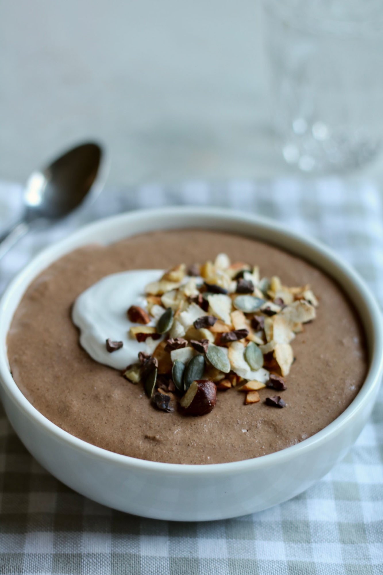 Keto chocolate chia pudding with toasted nut crunch.