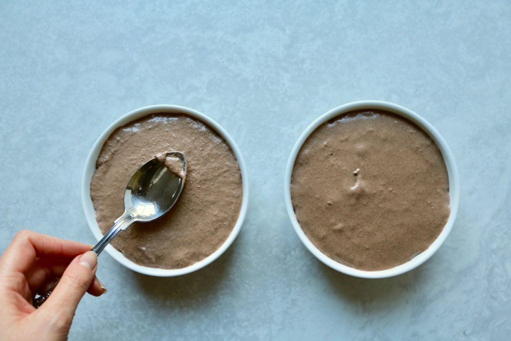 Keto chocolate chia pudding with toasted nut crunch.