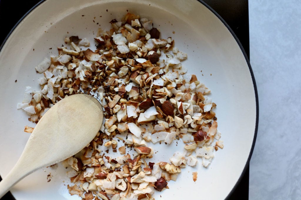 Keto chocolate chia pudding with toasted nut crunch.