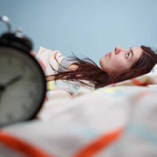 woman lying in bed