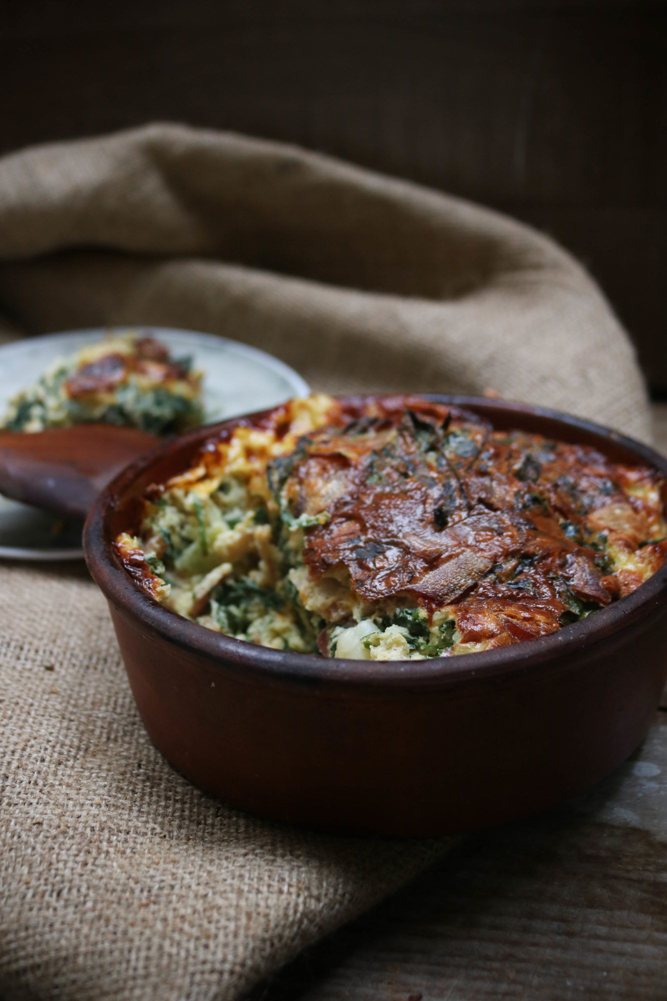 Keto crustless spinach bacon quiche.