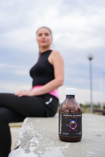 woman with liposomal glutathione